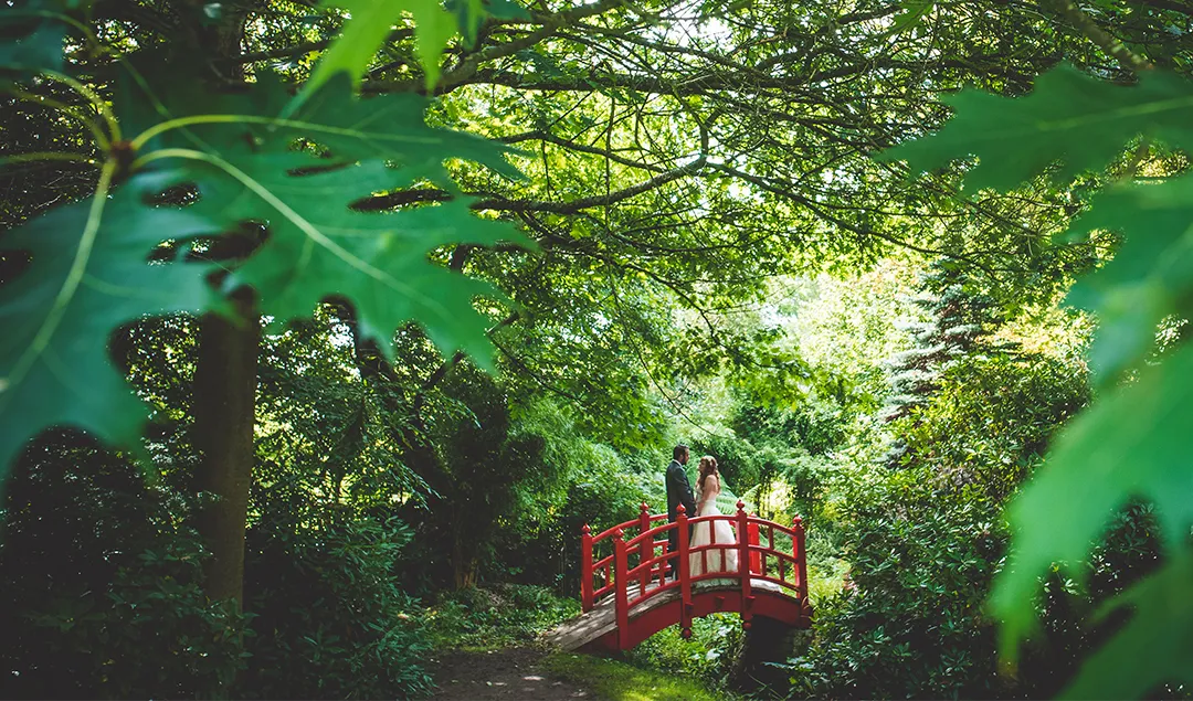 If you’re having your wedding day at Rivervale Barn in Hampshire you need to get a photo on the beautiful red bridge