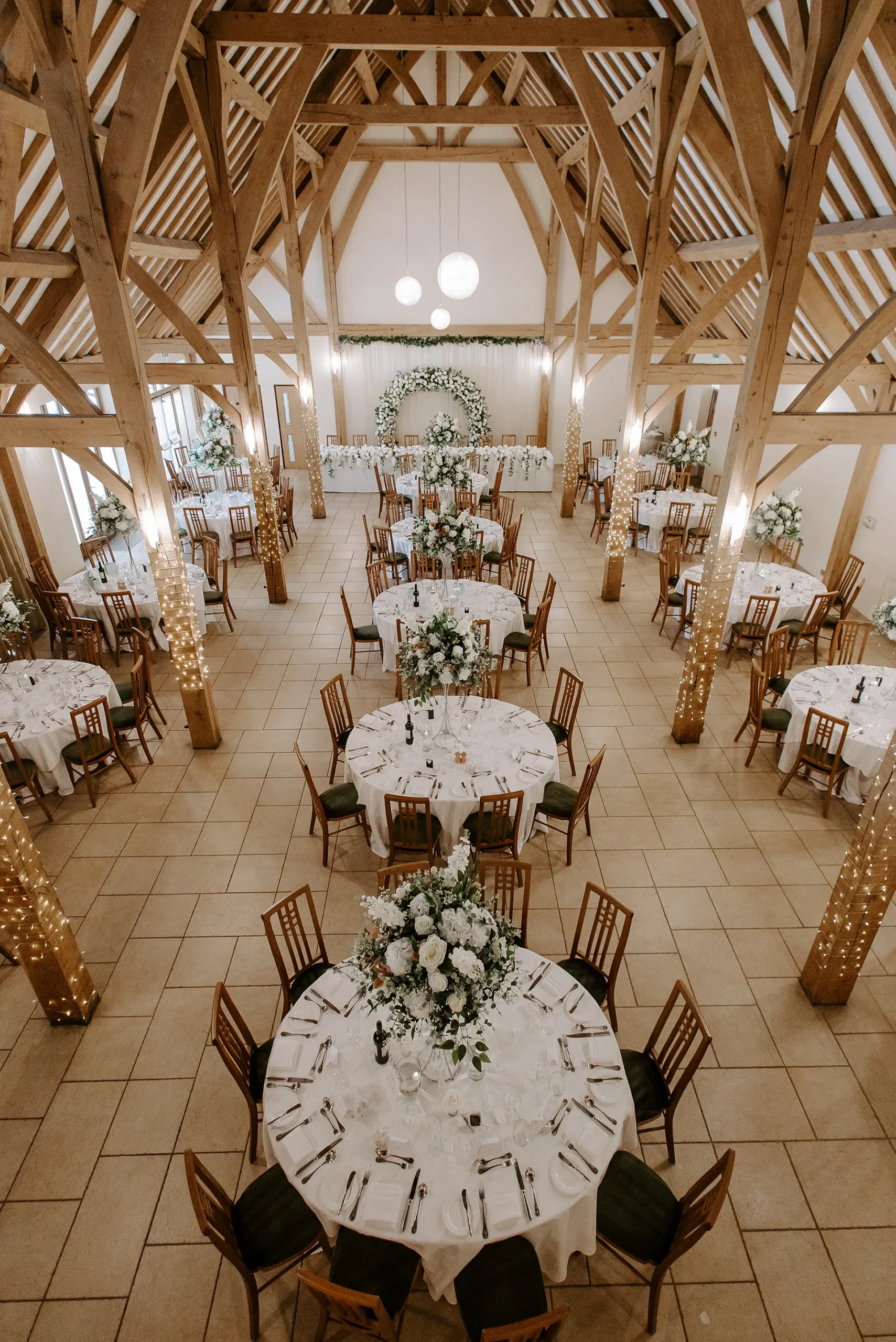 The Dining Barn at Rivervale Barn setup for a summer wedding