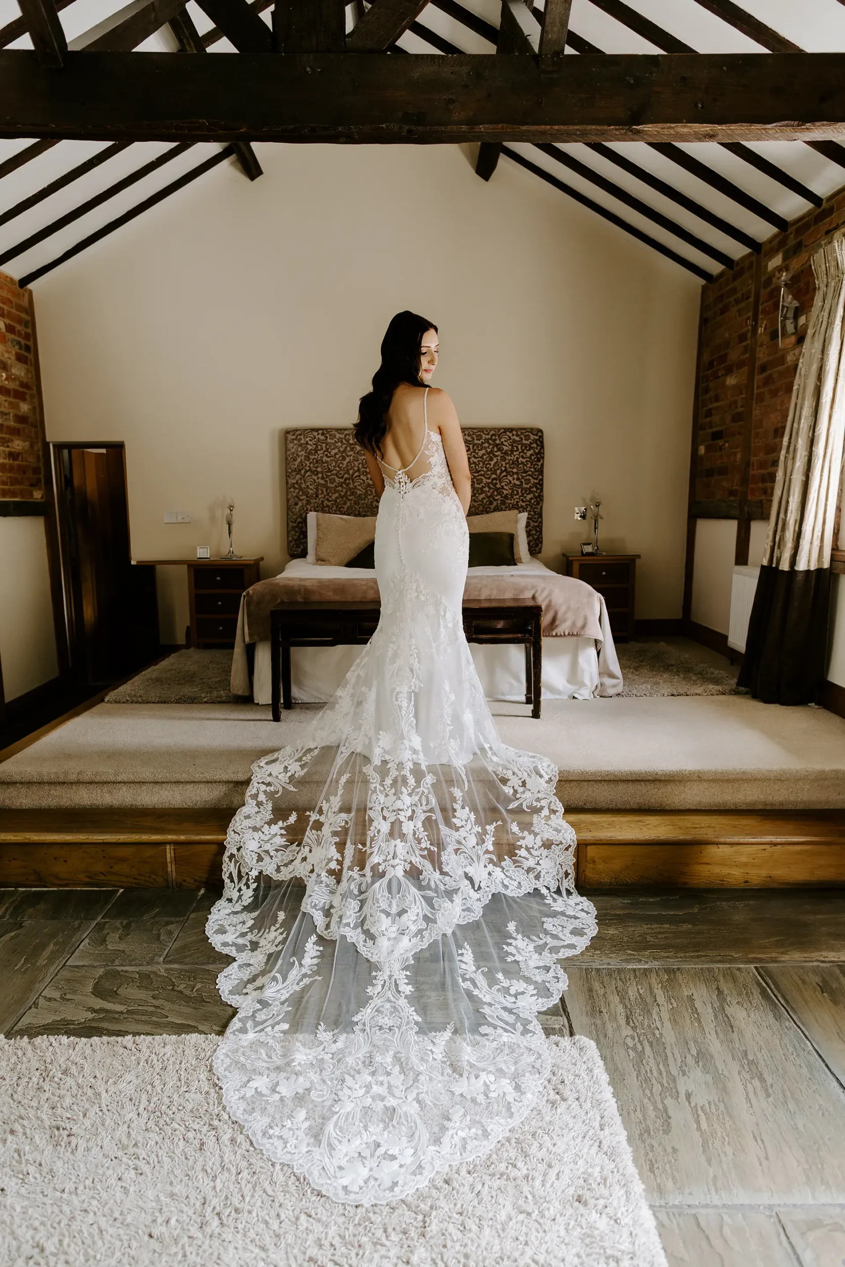 Bride getting ready in Rivervale Barn's honeymoon suite, the Cornstore Cottage