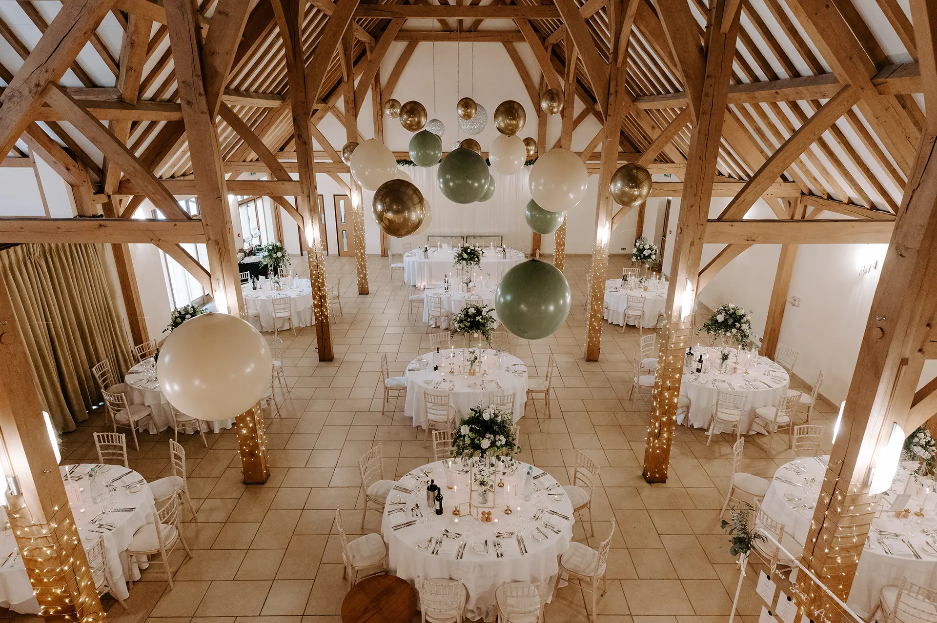The Dining Barn set up for a wedding reception at Rivervale Barn