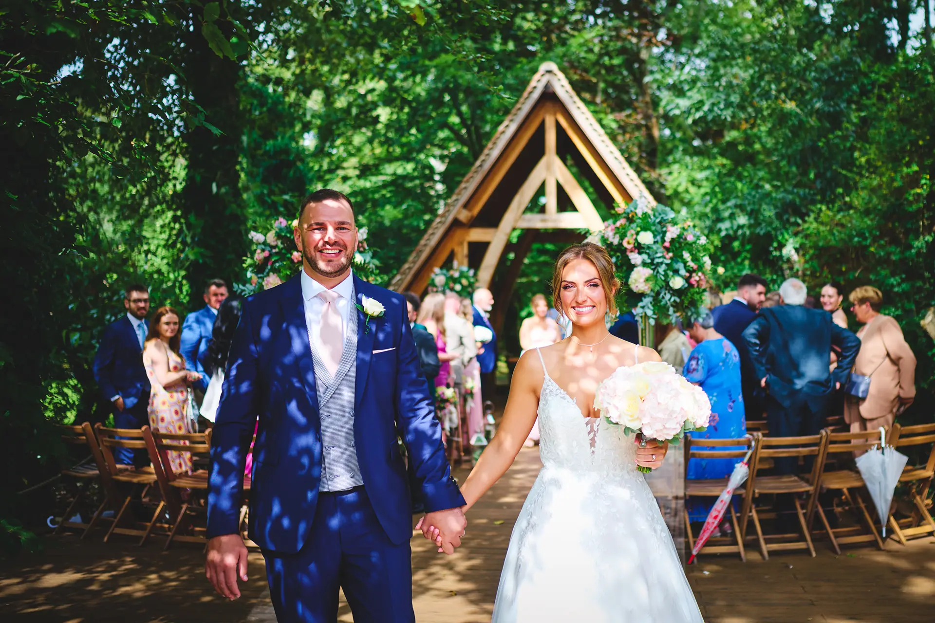 Couple just married at Rivervale Barn's The Spinney outdoor ceremony space