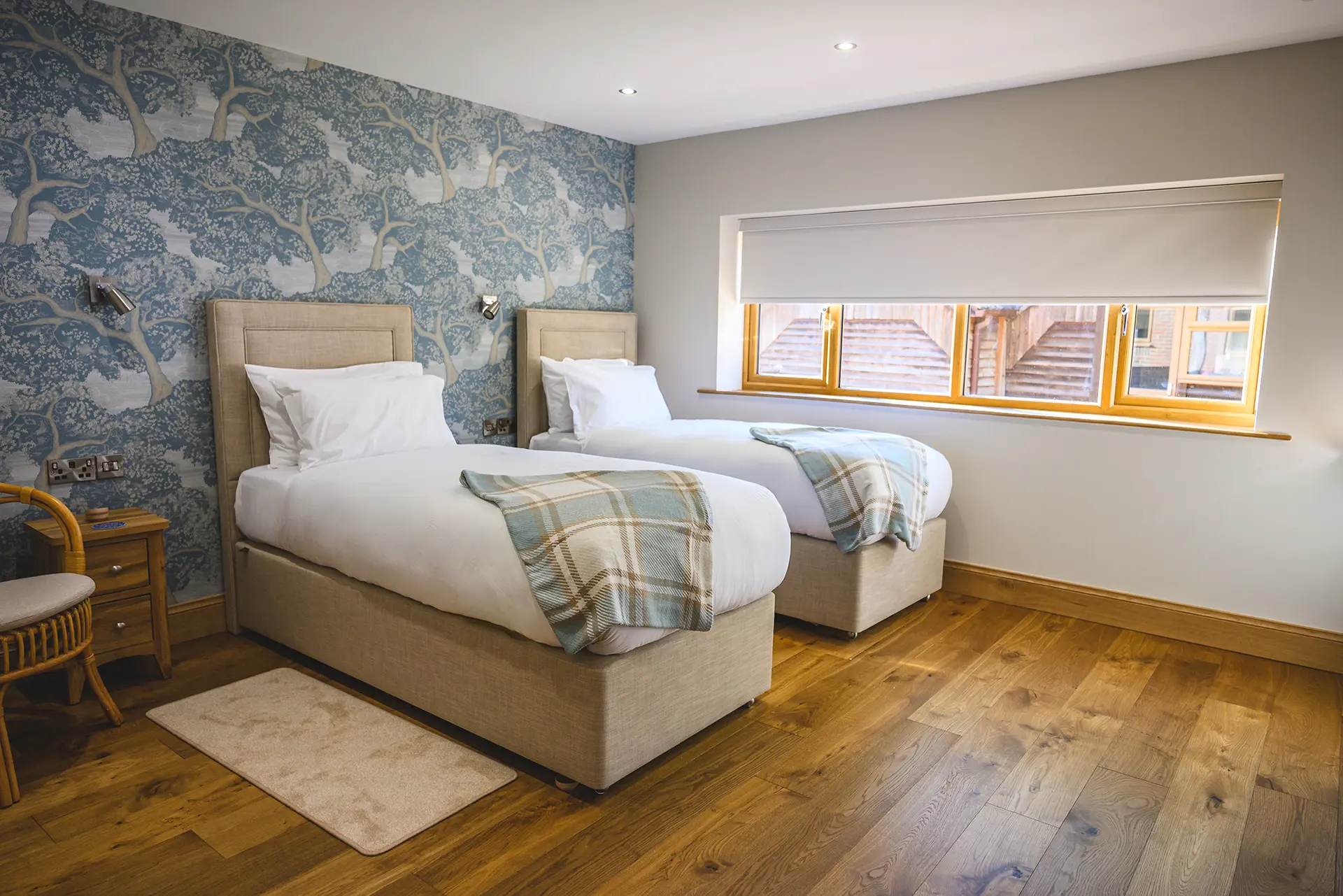 Twin bedroom in the Rivervale Lodge accommodation at Rivervale Barn