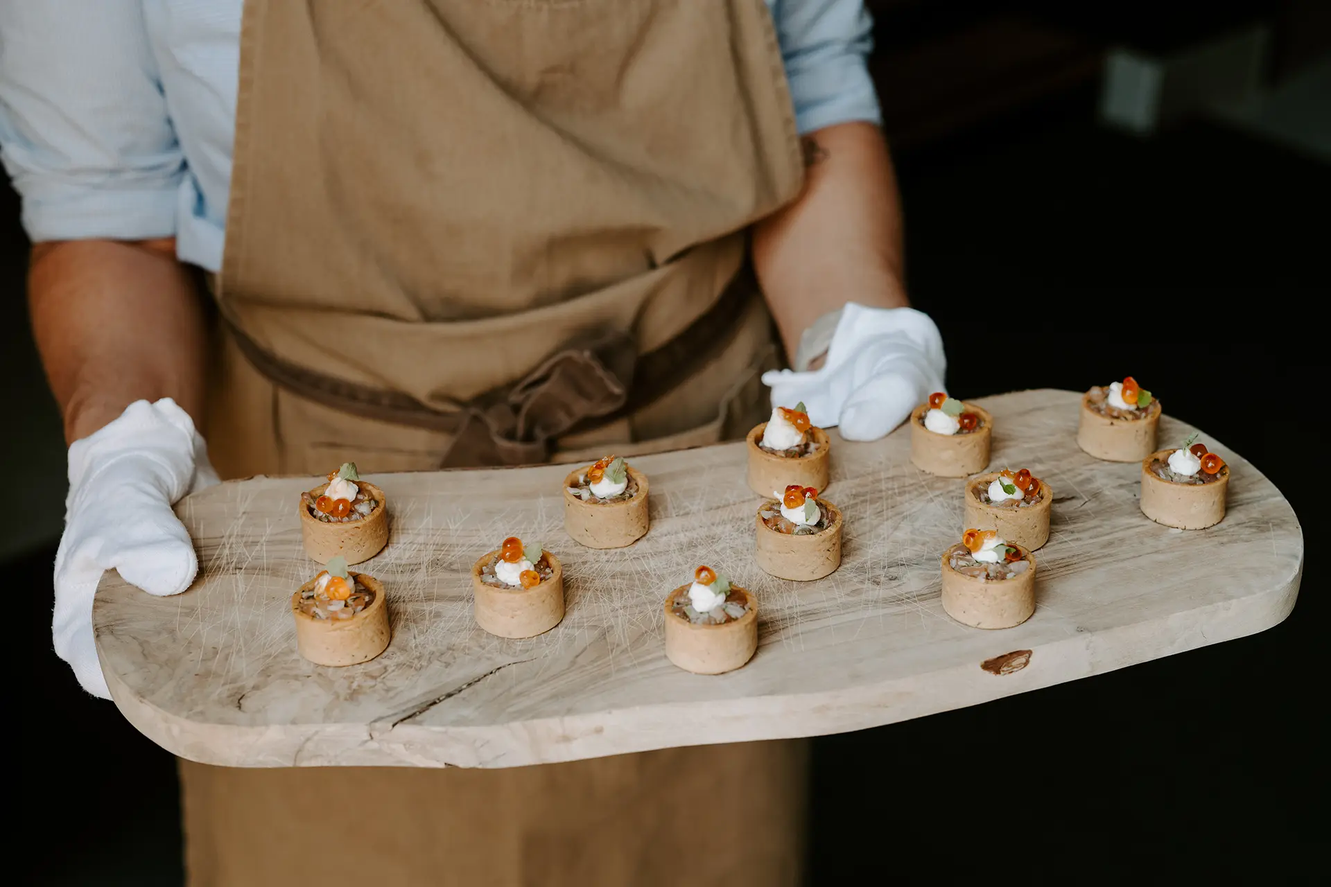 Salmon Tartar canapés from the wedding menu being served at Rivervale Barn