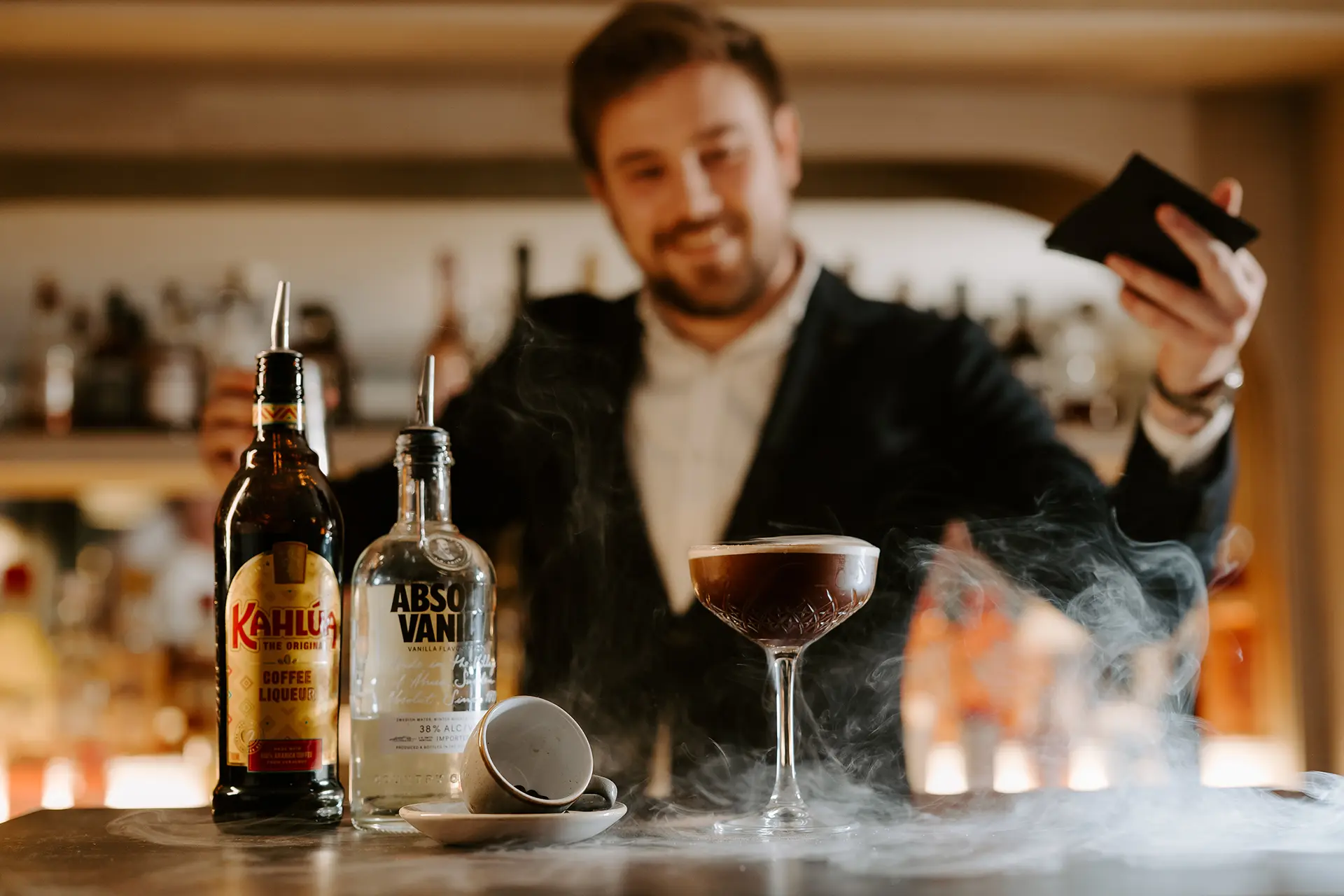 Bar staff member making a espresso martini cocktail at Rivervale Barn