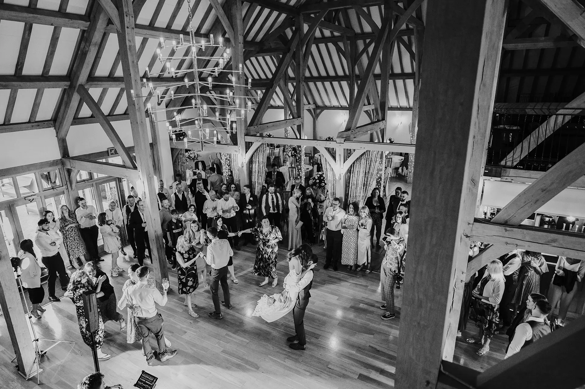 Evening wedding reception in Rivervale Barn's dancefloor