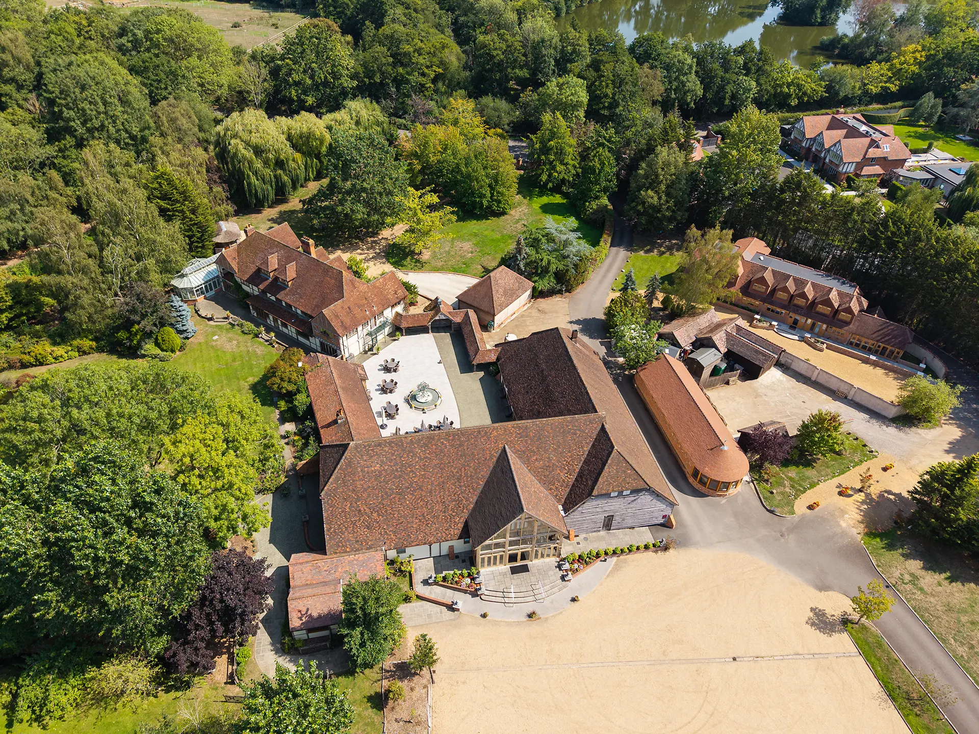 Venur exterior drone shot of Rivervale Barn