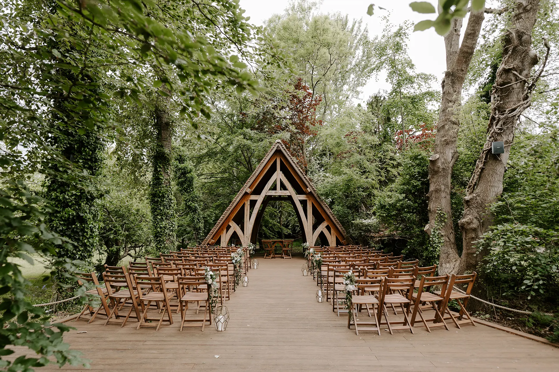 The outdoor wedding ceremony space at Rivervale Barn - The Spinney
