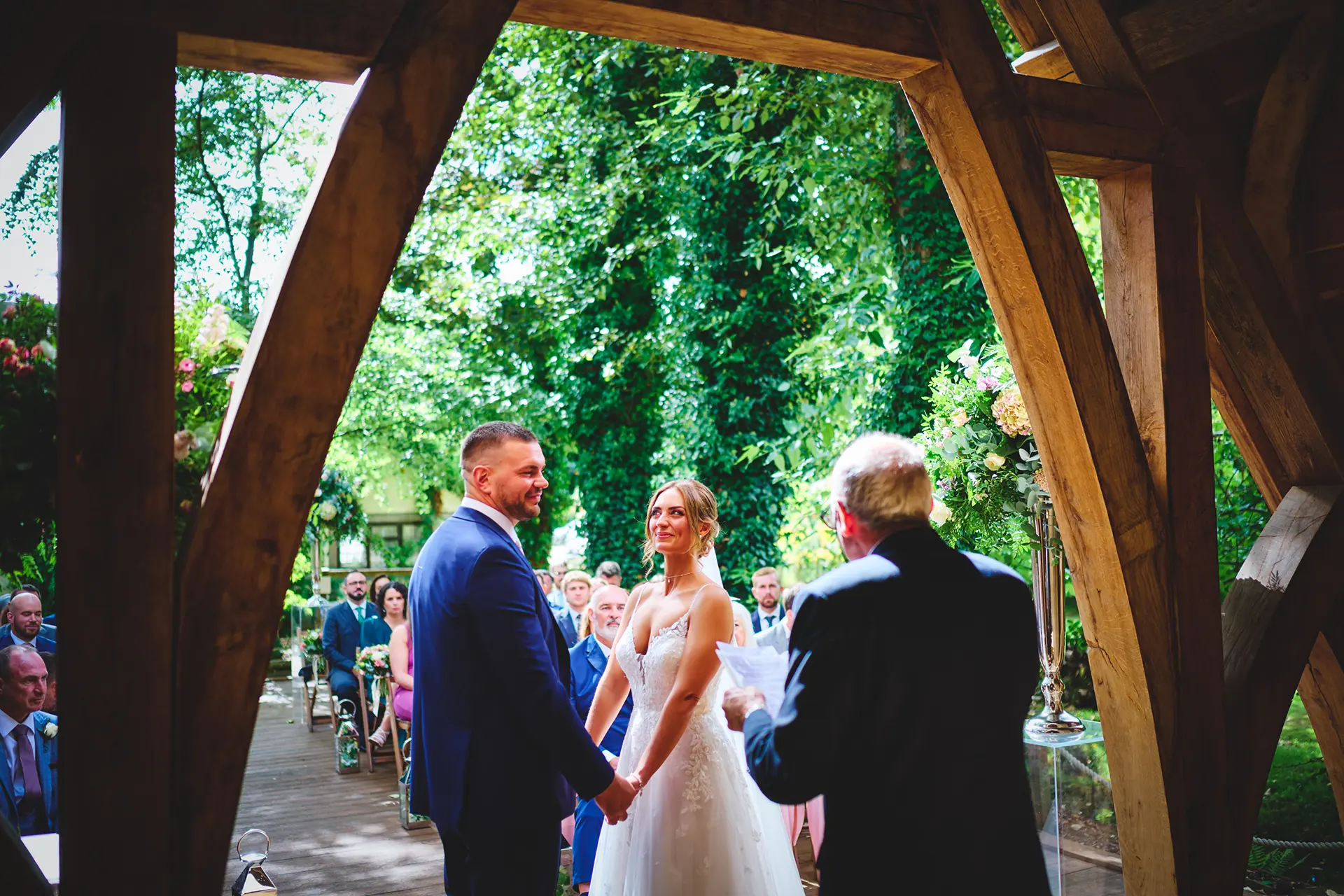 Couple getting married in The Spinney at Rivervale Barn