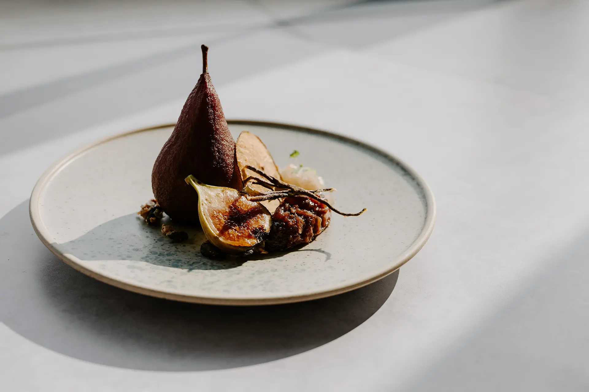 Poached pear dessert from Riverale Barn's autumn/winter wedding menu