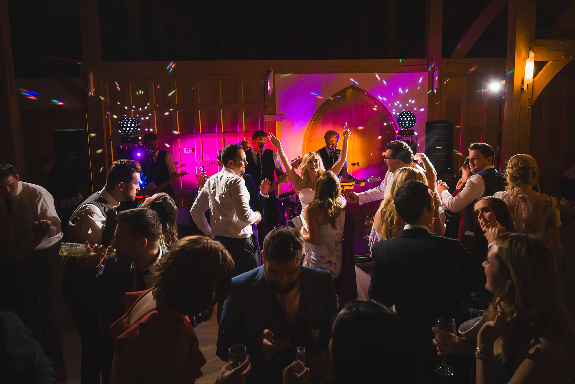 Wedding guests dancing at the evening reception at Rivervale Barn