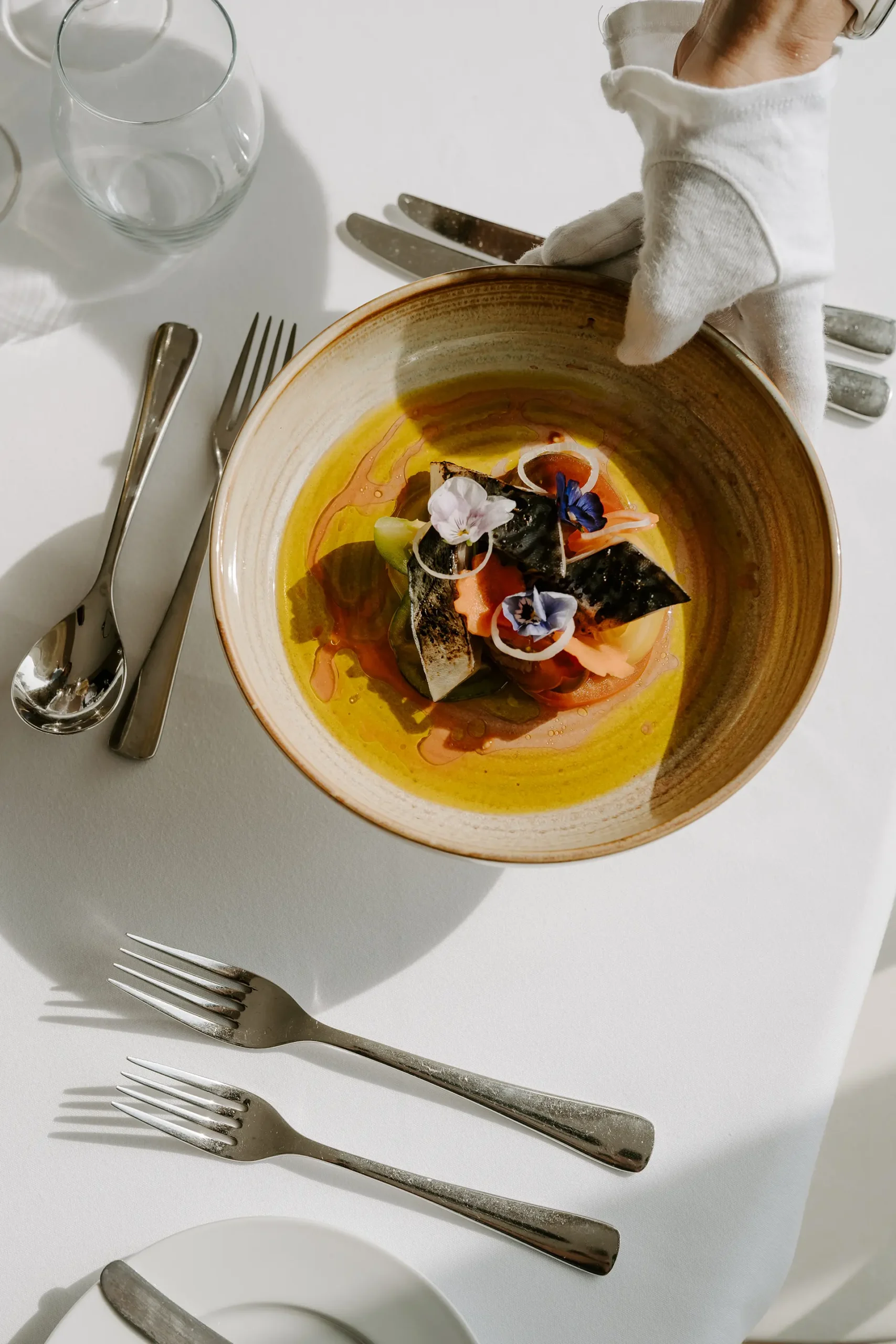 Pickled mackerel from the spring summer wedding menu being served at a table