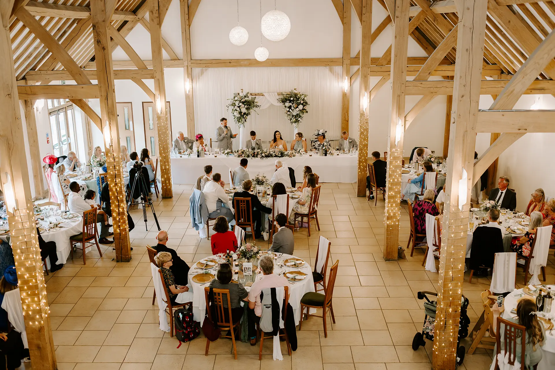 Wedding reception taking place in the Dining Barn at Rivervale Barn