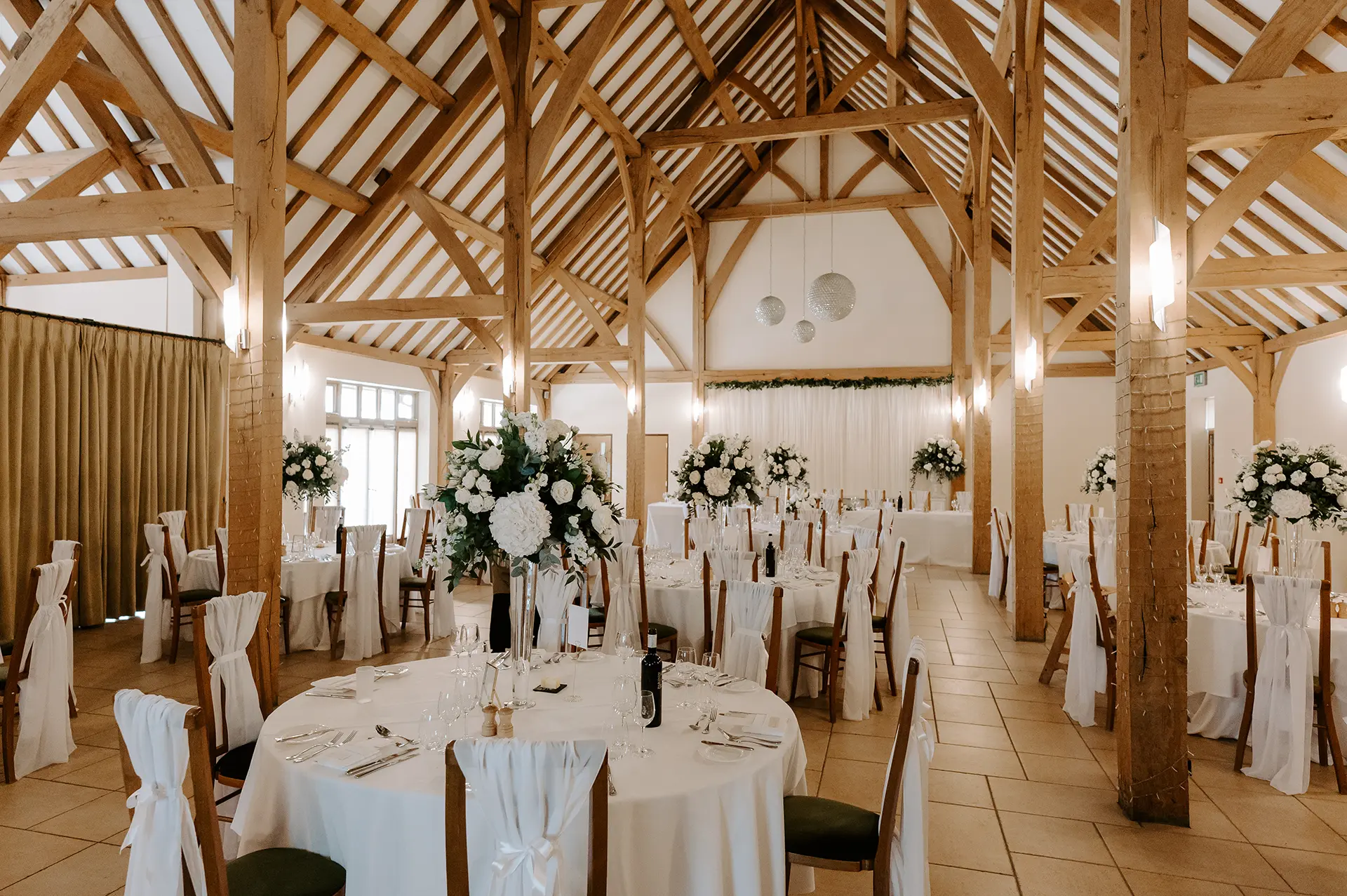 The Dining Barn at Rivervale Barn dressed for a wedding reception