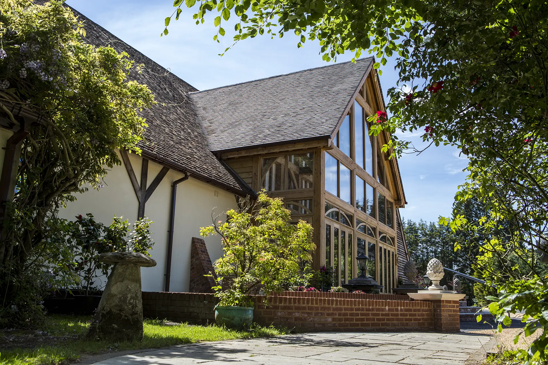 A view of Rivervale Barn wedding venue from the gardens