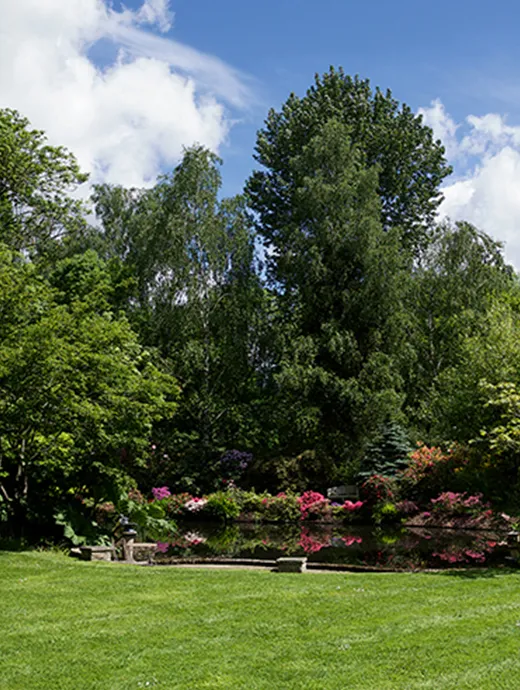 Vibrant gardens add even more beauty to this stunning barn wedding venue in Hampshire
