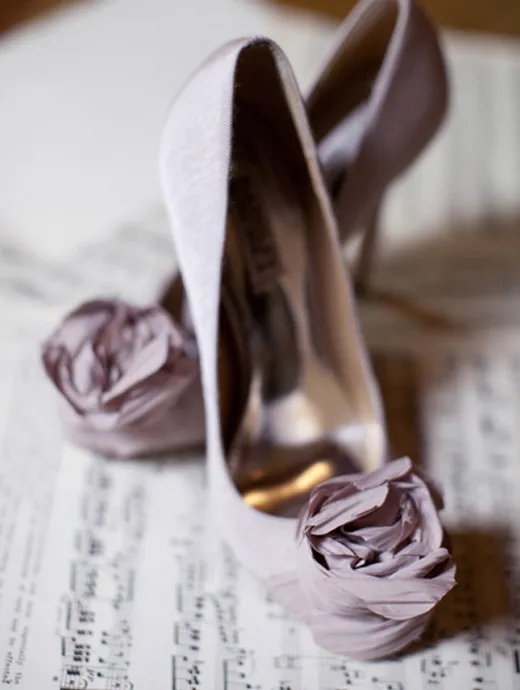 lilac and mauve wedding shoes ready for the bride to wear on her summer wedding day