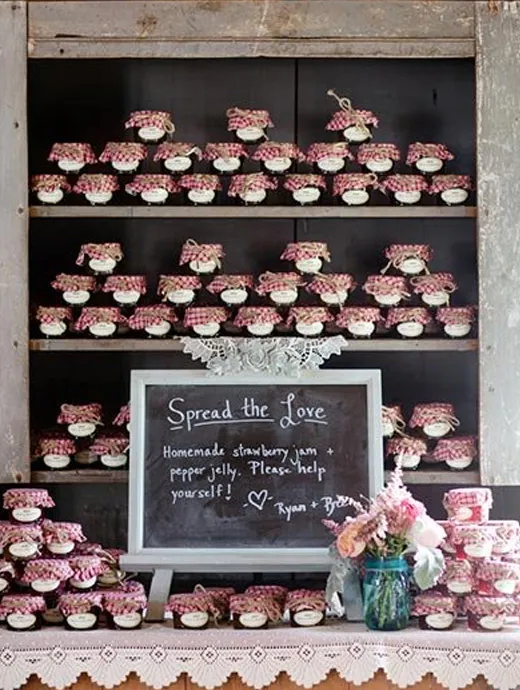 pots of jam were given as wedding favours to match the summer berries wedding theme