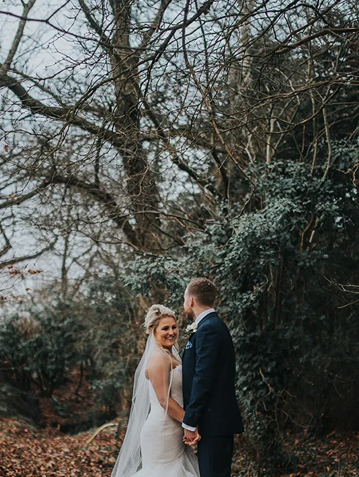The bride and groom fell in love with this barn wedding venue in Hampshire for their Christmas themed wedding