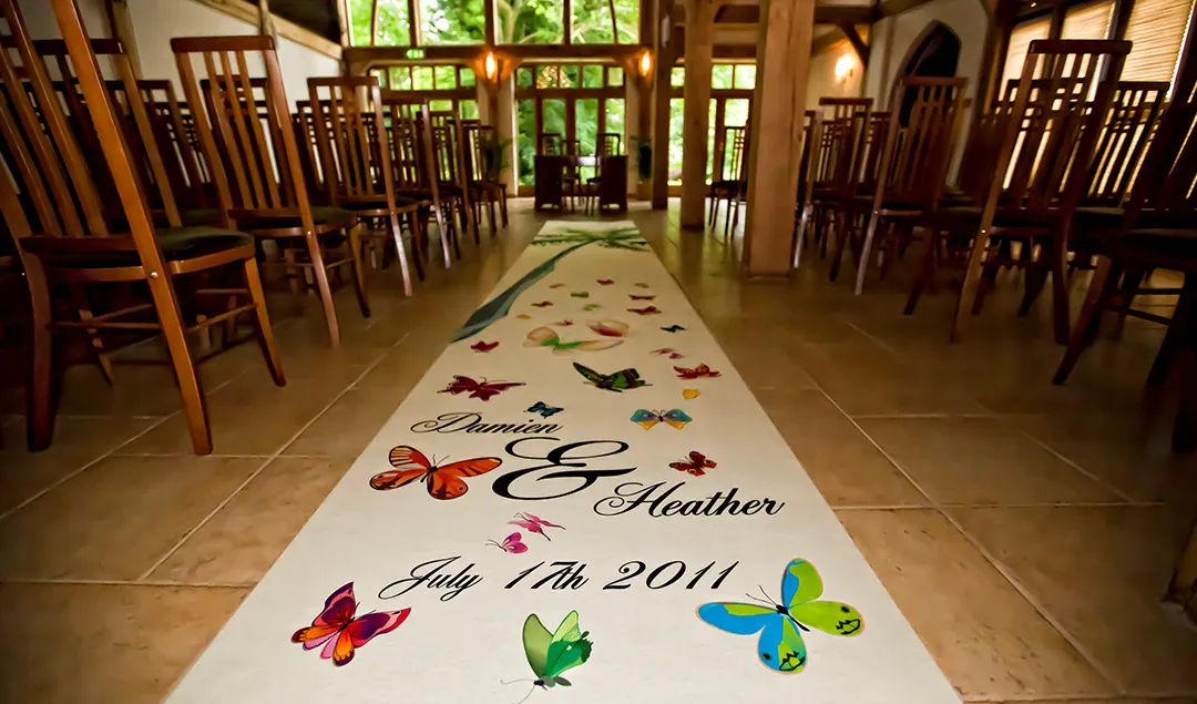 The Ceremony Barn at Rivervale Barn dressed for a tropical themed wedding