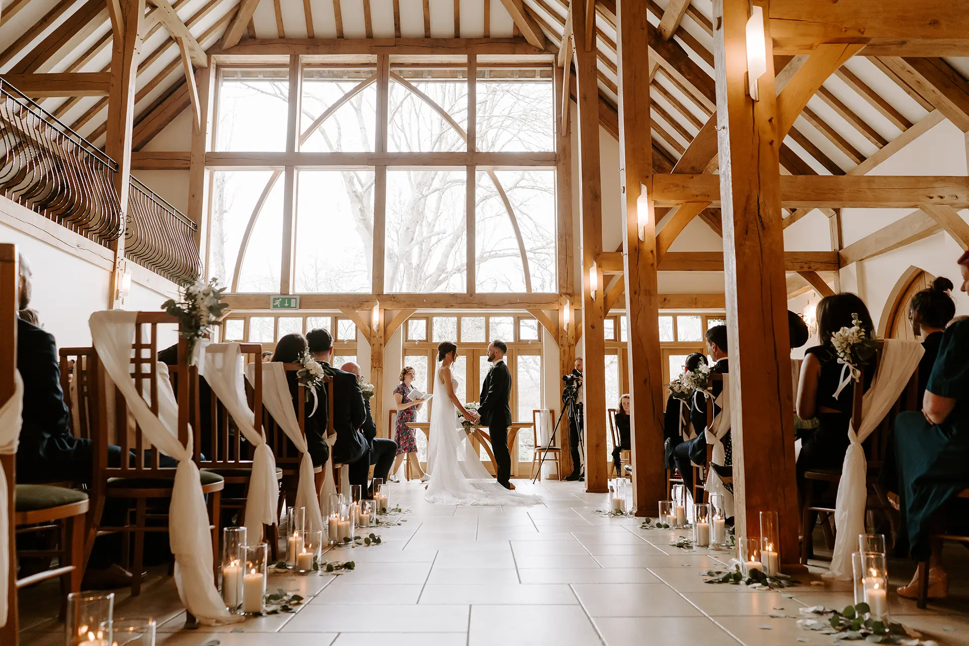 Couple getting married in the Ceremony Barn at Rivervale Barn