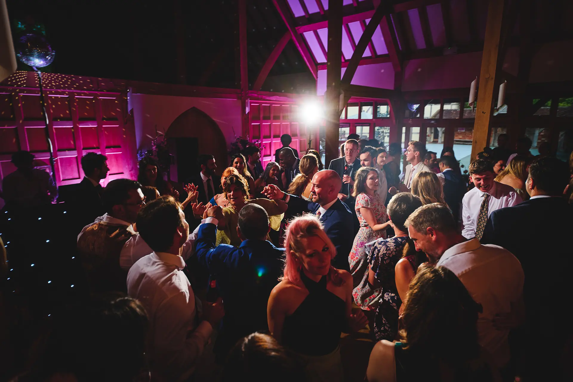 Guests dancing at an evening reception at Rivervale Barn