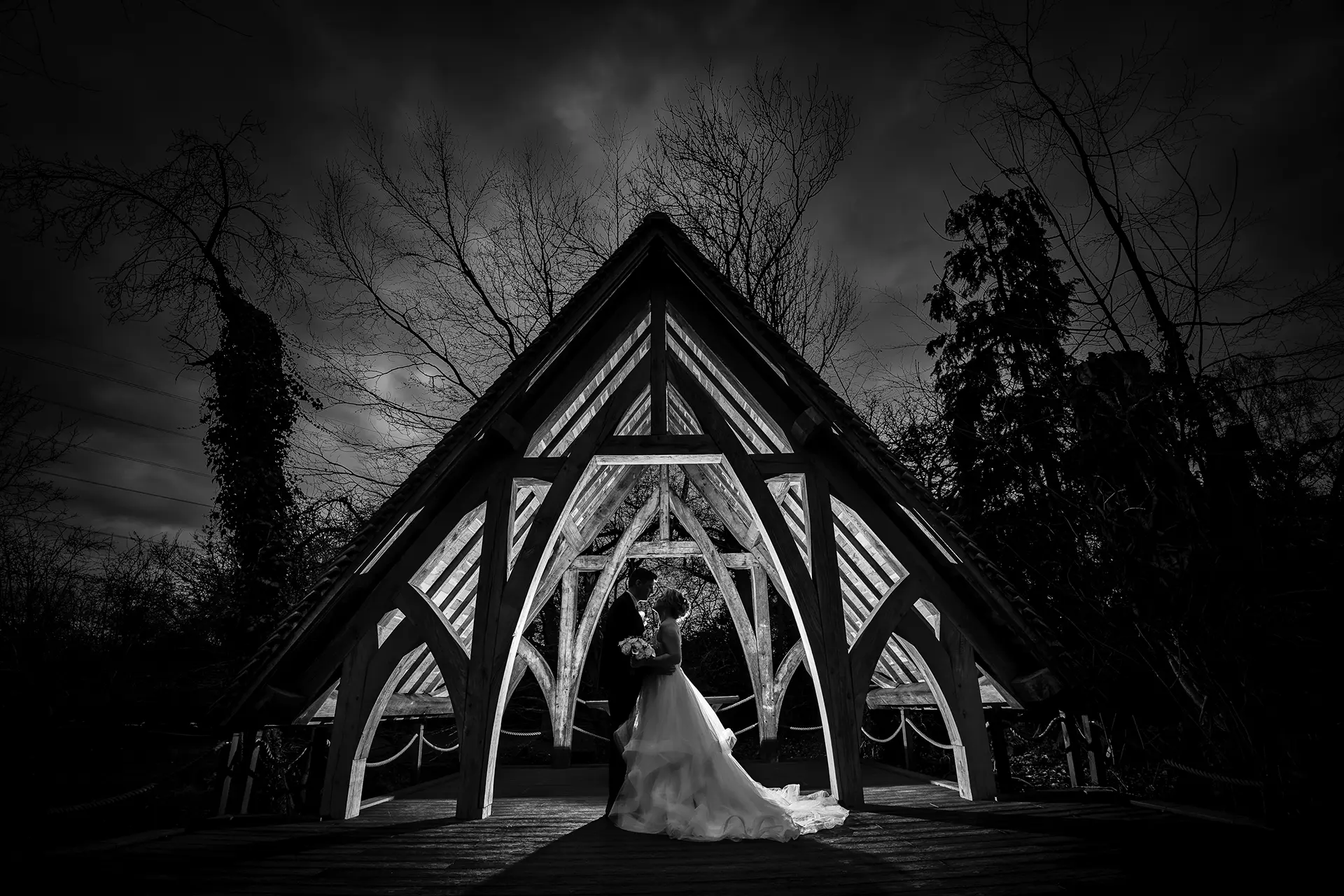 Bride and groom by the Spinney at Rivervale Barn