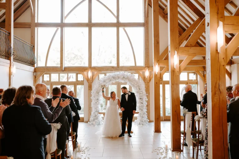 Couple just married in the Ceremony Barn at Rivervale Barn