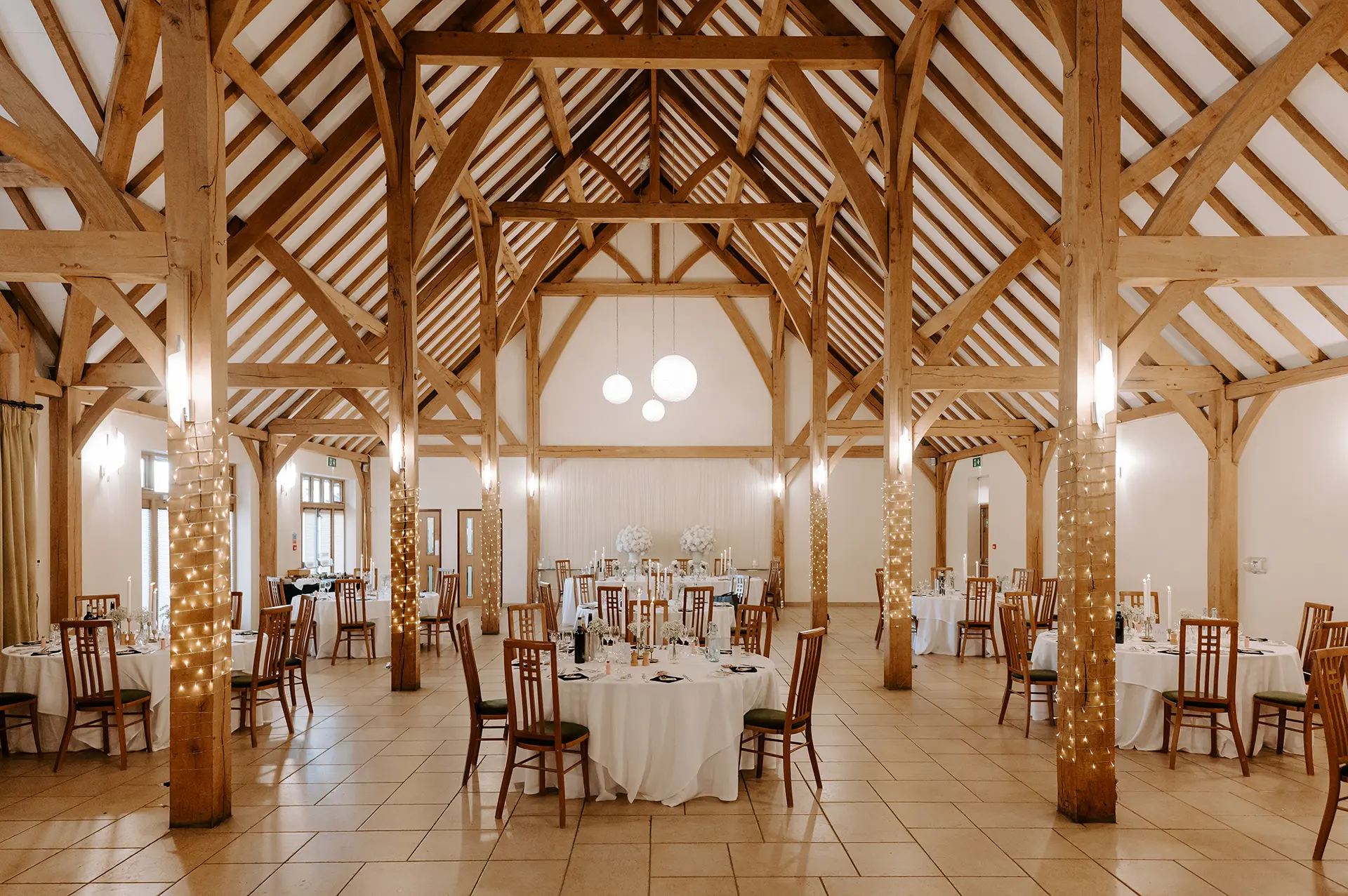The Dining Barn at Rivervale Barn setup for a winter wedding reception