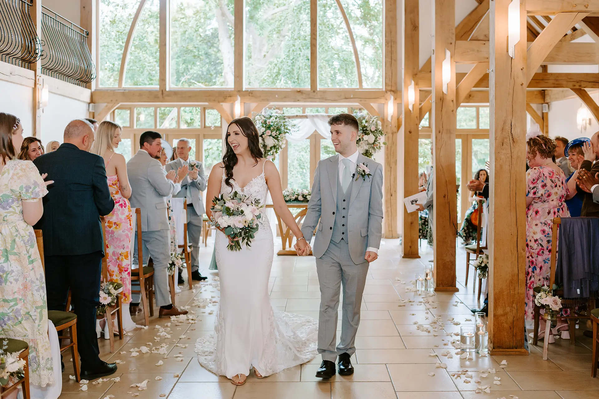 Couple just married in the Ceremony Barn at Rivervale Barn