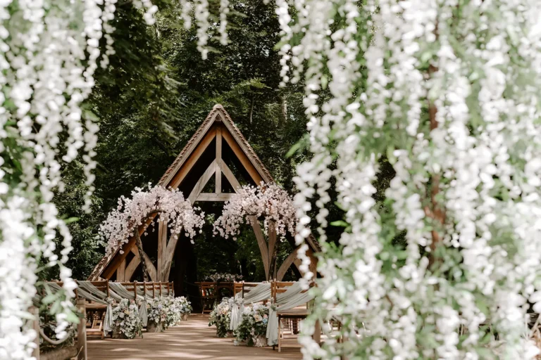 The Spinney outdoor ceremony space setup for a wedding at Rivervale Barn