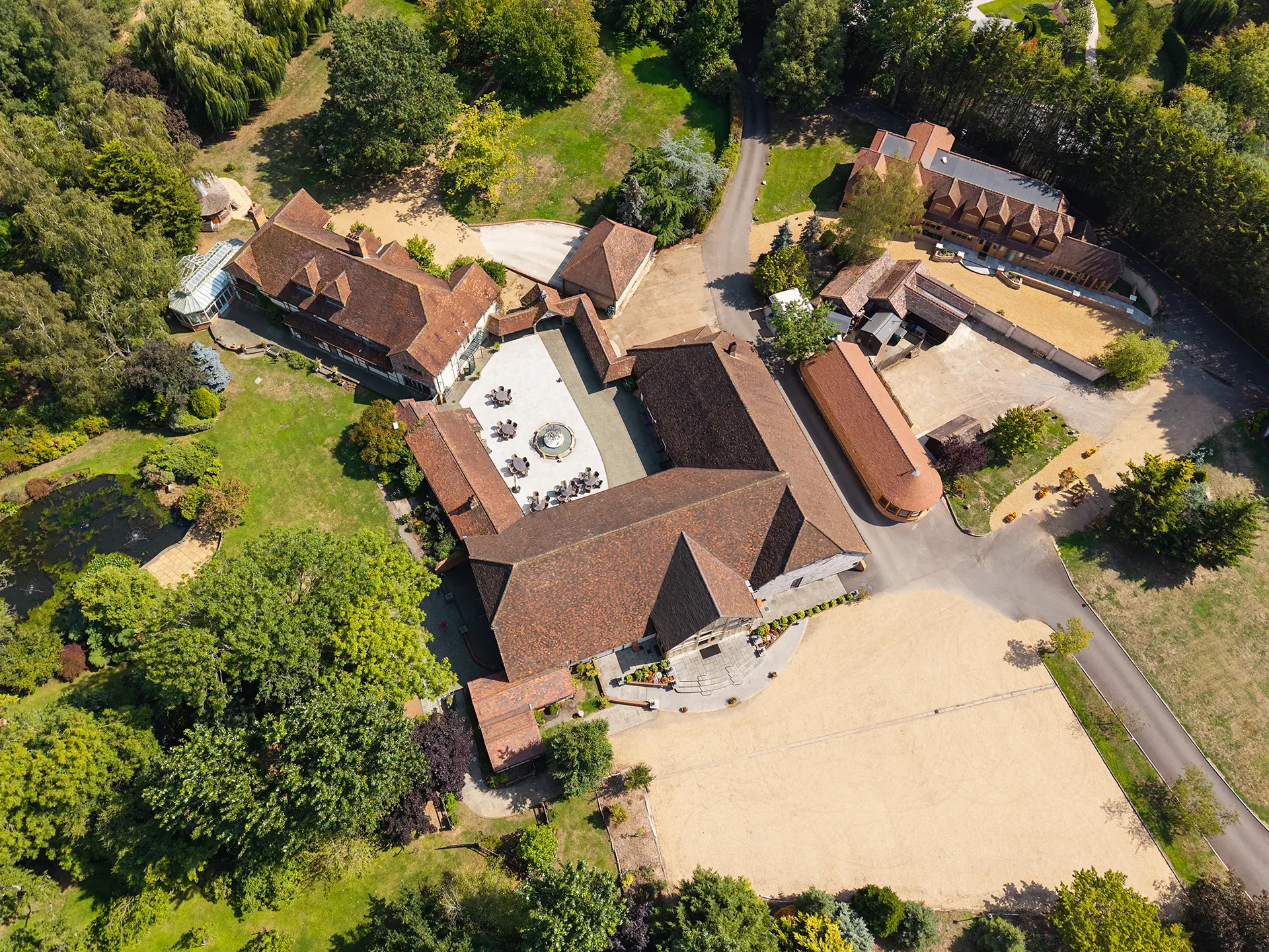 Drone view of Rivervale Barn wedding venue and gardens