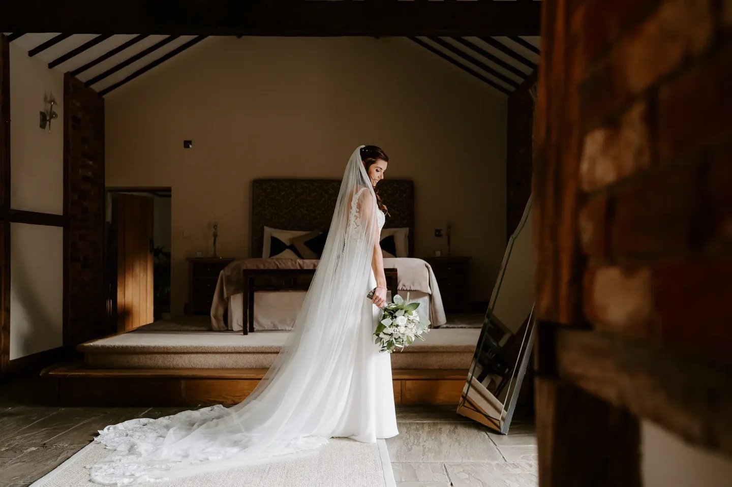 Bride getting ready in the Cornstore Cottage at Rivervale Barn