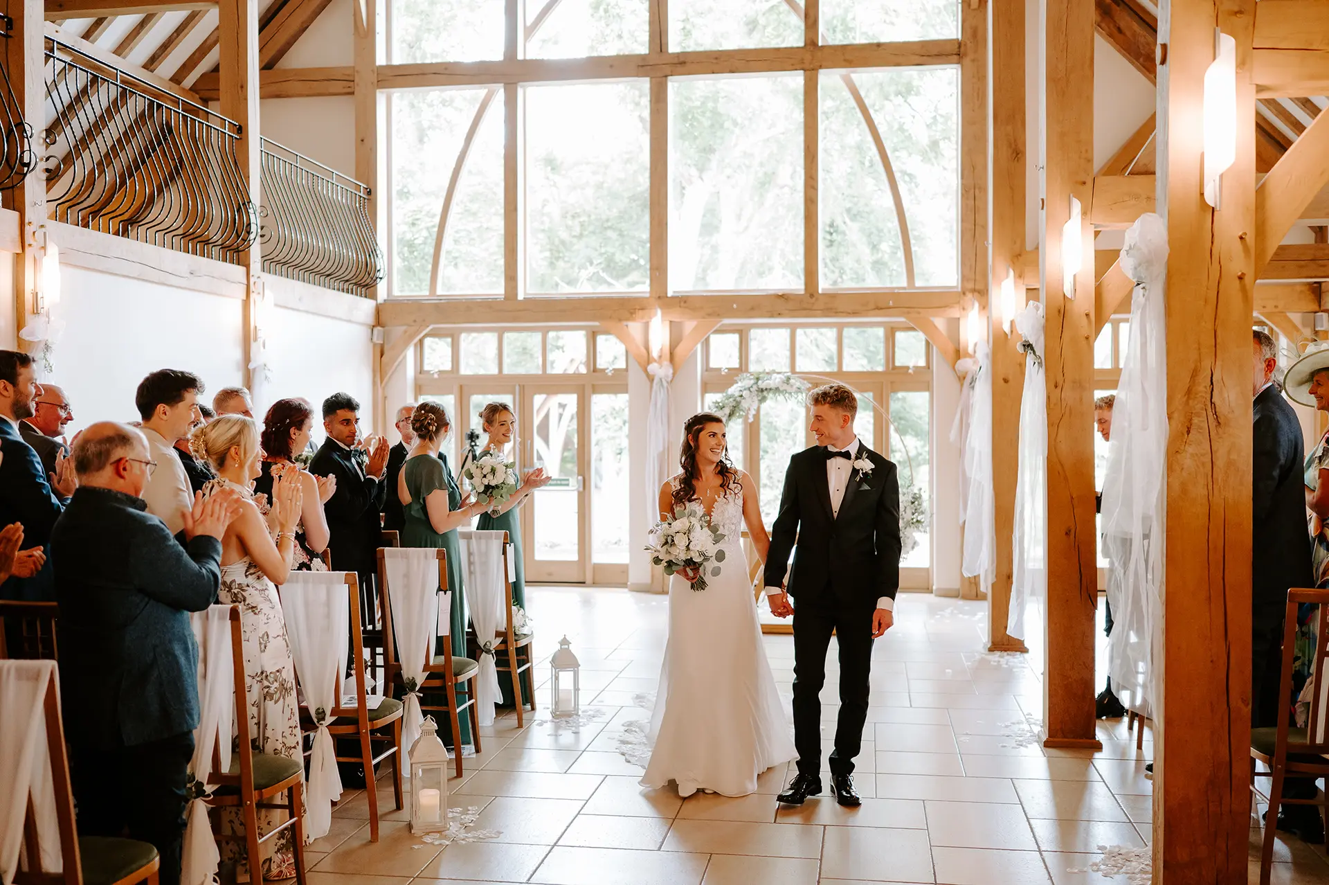 Bride and groom just married in the Ceremony Barn at Rivervale Barn