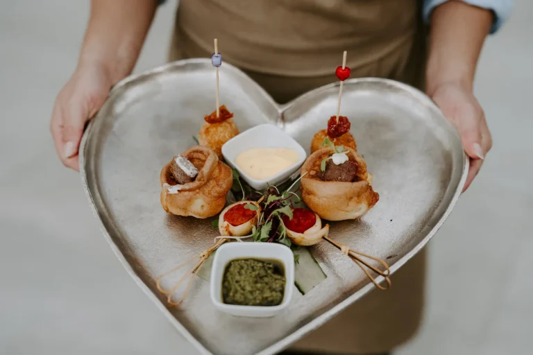 Canapés being served at a wedding reception at Rivervale Barn