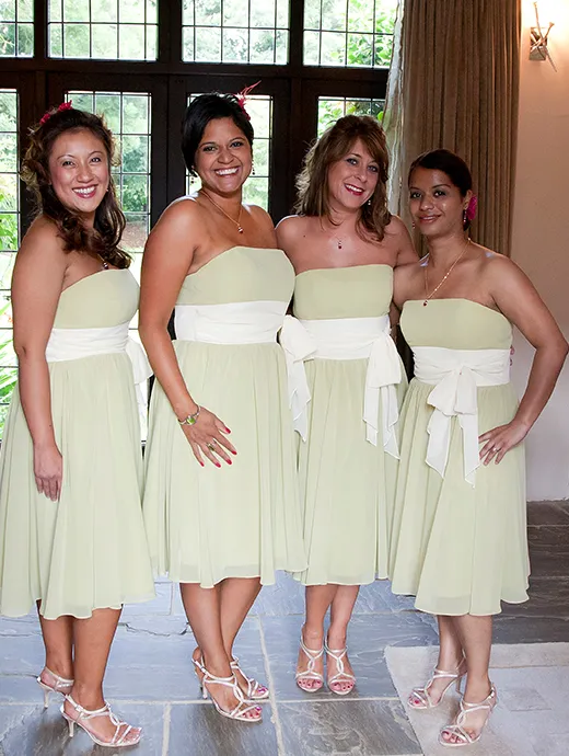 Bridesmaids dressed for a tropical themed wedding