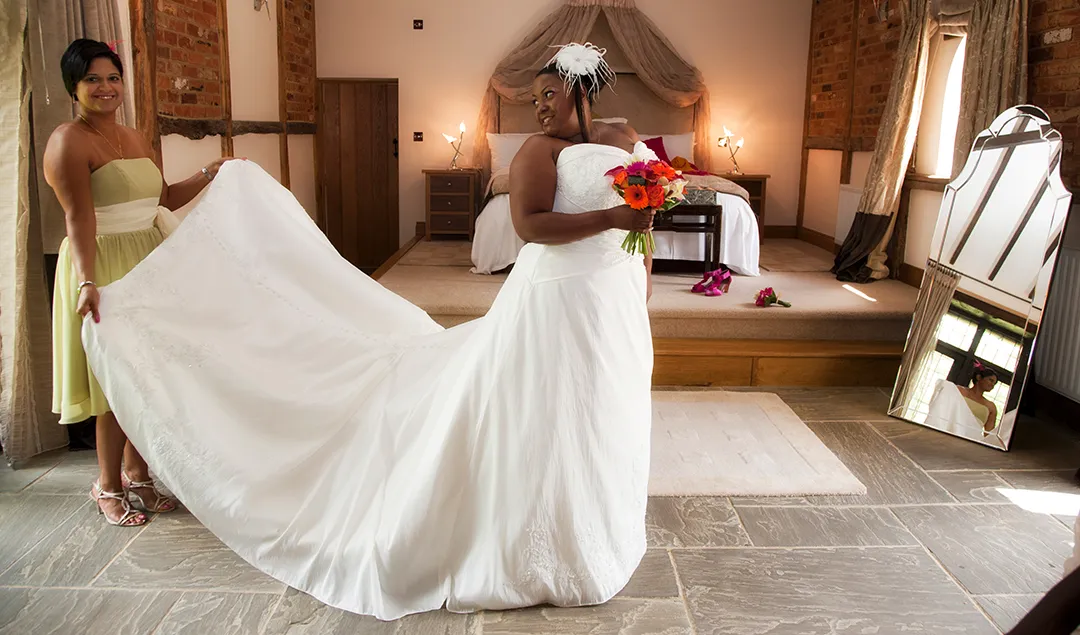 Bride getting ready for her wedding in the Cornstore Cottage at Rivervale Barn
