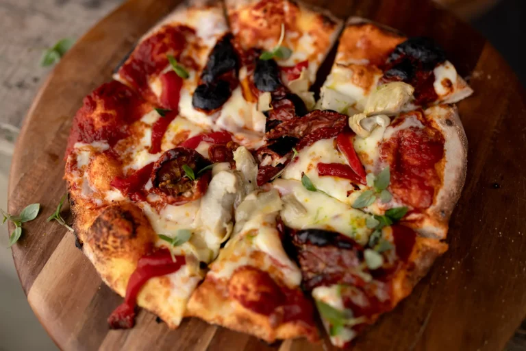 Wood fired pizza being served at an evening reception at Rivervale Barn